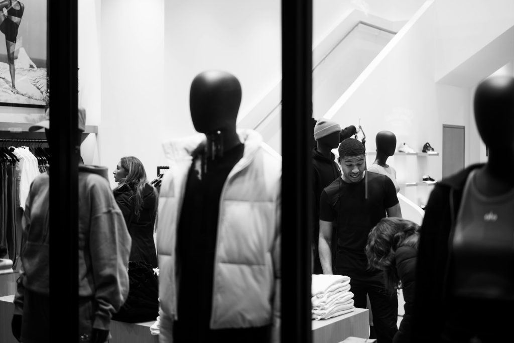 Mannequins in a clothing store window display