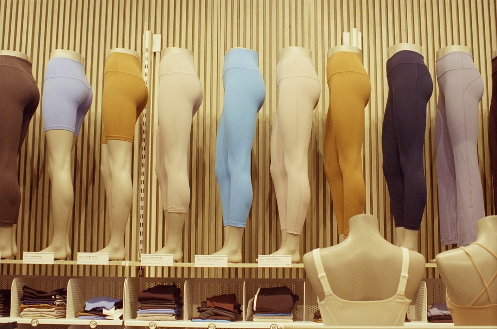 Mannequins displaying colorful leggings and athletic wear