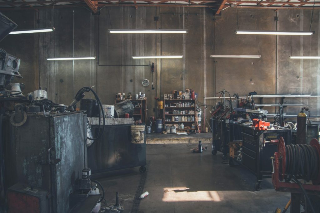 Black tool chest near a wire spool