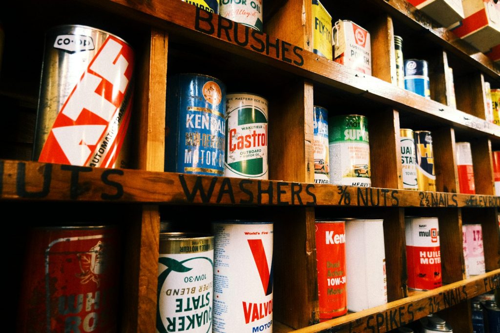 Shelves stocked with vintage paint cans and hardware