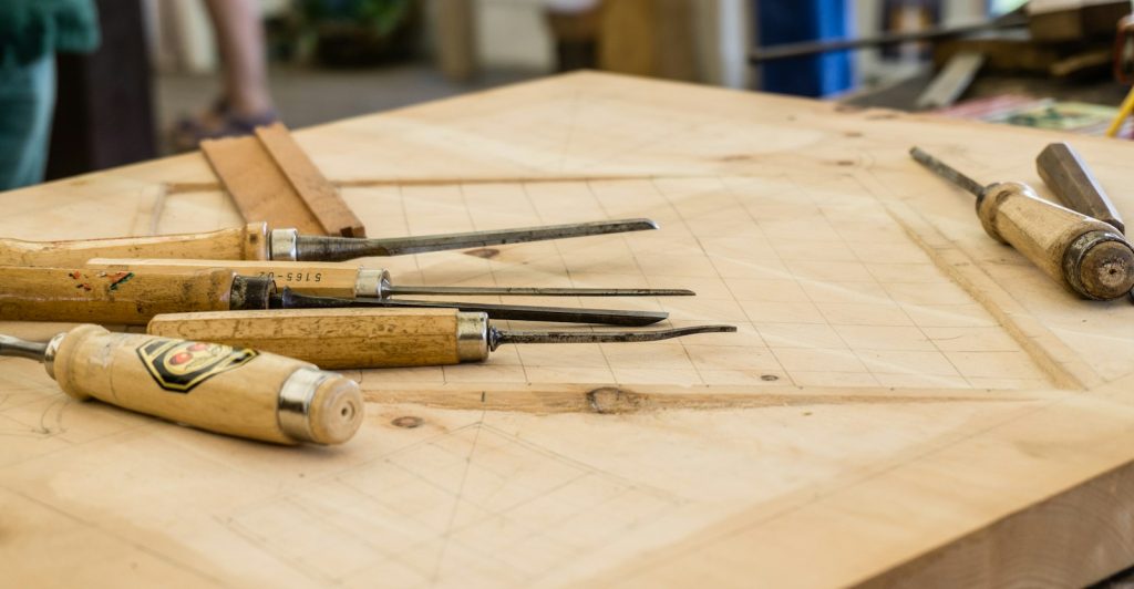 Hand tools laid out on a table