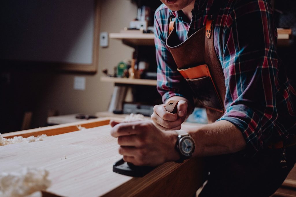 Man working on a piece of wood